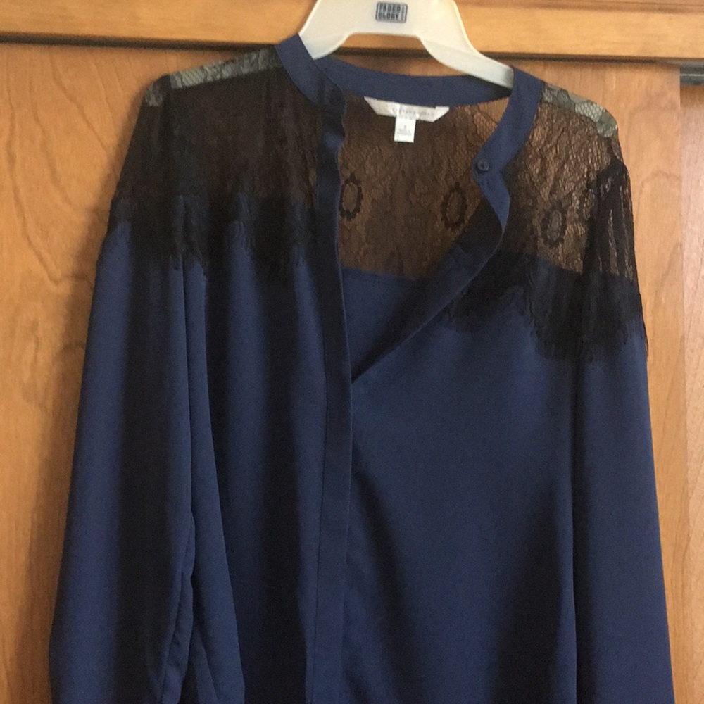 Blue and black lacey blouse.